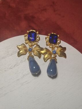 Gold Bow Drop Earrings with Sapphire Blue Stones